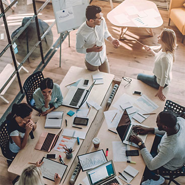 People around a desk