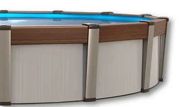 Close-up of an above-ground pool: dark wood-grain top rail, taupe vertical supports, light-textured walls, and clear blue water.